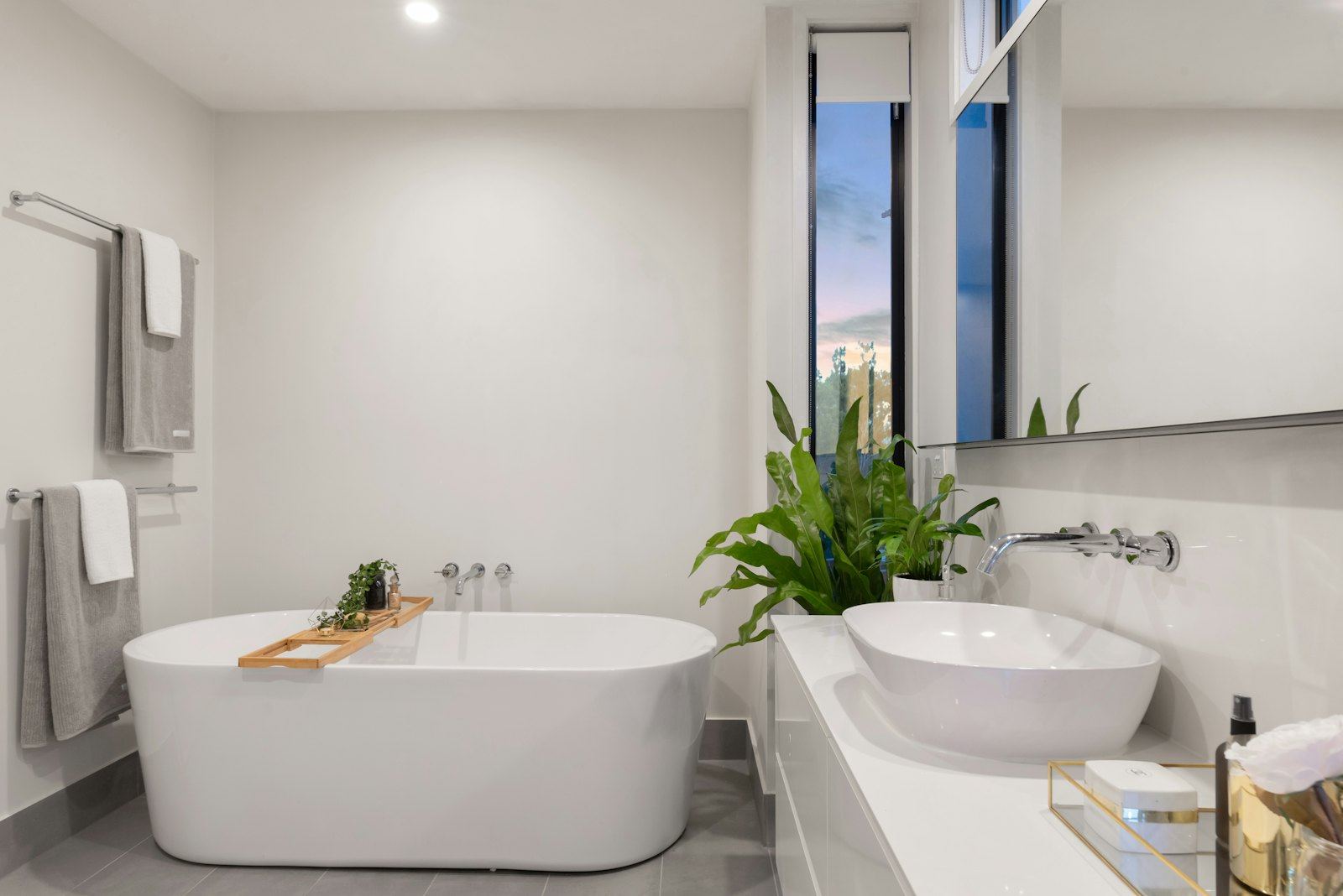 Bright bathroom with freestanding tub